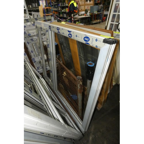 101 - 7 various PVC window frames, none have double glazed units fitted and none are included. It is not p... 