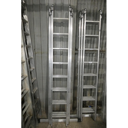 290 - A Youngman aluminium triple extending ladder (3 x 8 rung)