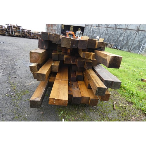 727 - A quantity of wooden posts to include 10cm x 10 c, 17cm x 7cm, 15cm x 15cm etc. Lengths vary up to a... 