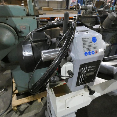 627 - An Axminster Trade Series wood turning lathe on a stand type AW1628VS, 240v, digital rpm gauge, vari... 