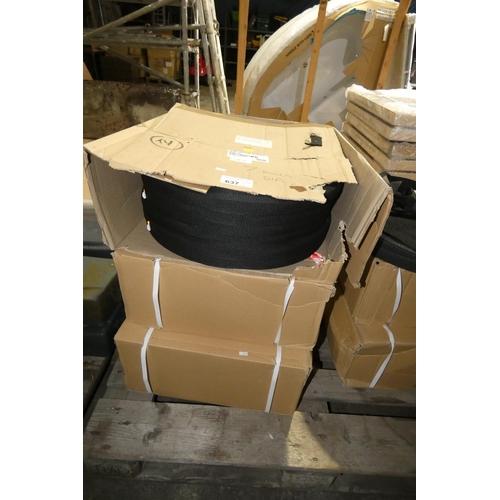 637 - 3 boxes containing rolls of flat black webbing (approx 3cm wide)