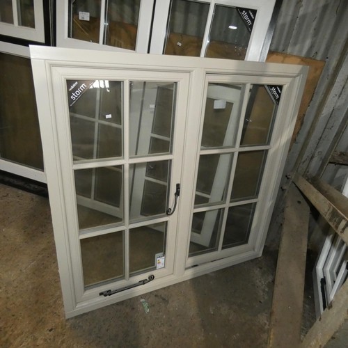 37 - An Evolution Storm PVC double glazed casement window, colour is cream on both sides with external de... 