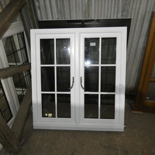 42 - A PVC double glazed casement window, colour is silver Oak outside / white inside , overall size of f... 