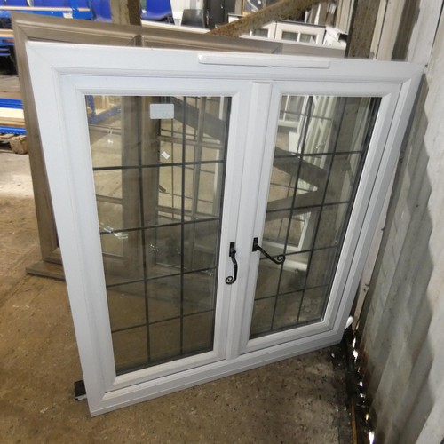 43 - A PVC double glazed casement window, colour is black outside / white inside , overall size of frame ... 