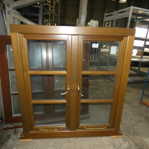 44 - An engineered hardwood double glazed casement window, colour is dark Oak stain both sides, overall s... 