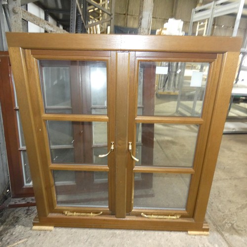 44 - An engineered hardwood double glazed casement window, colour is dark Oak stain both sides, overall s... 