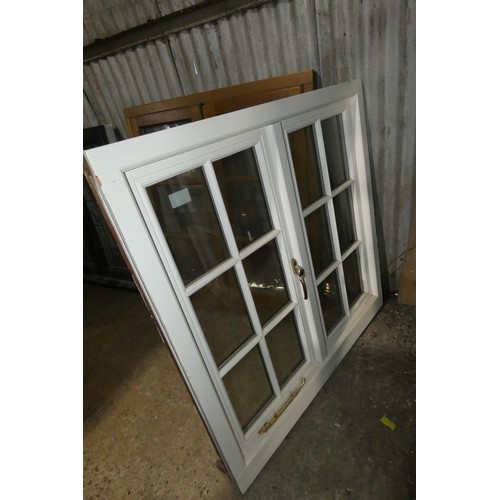 45 - An engineered Redwood timber double glazed casement window, colour is dark stain outside / white ins... 