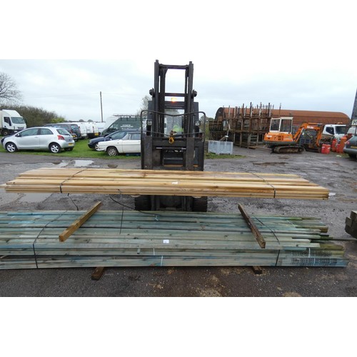 A quantity of wooden decking boards with various profiles, lengths vary