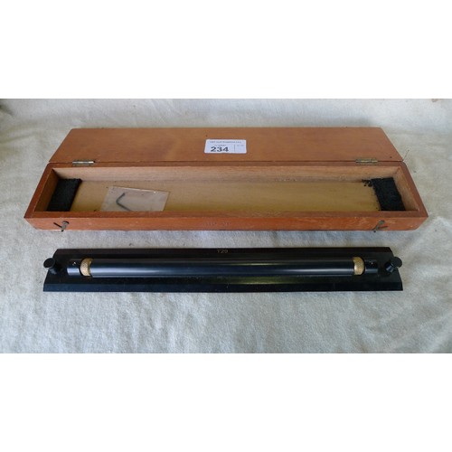 234 - A vintage precision 17.5 inch black painted metal T29 rolling ruler supplied in a wooden case