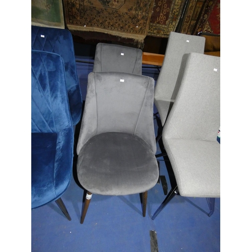 452 - 2 grey upholstered dining chairs with wood effect metal legs