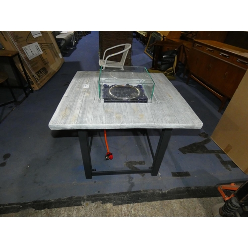 467 - A propane gas outdoor fire table approx. 85 x 85 x 71cm high. Please note there is damage to the top... 