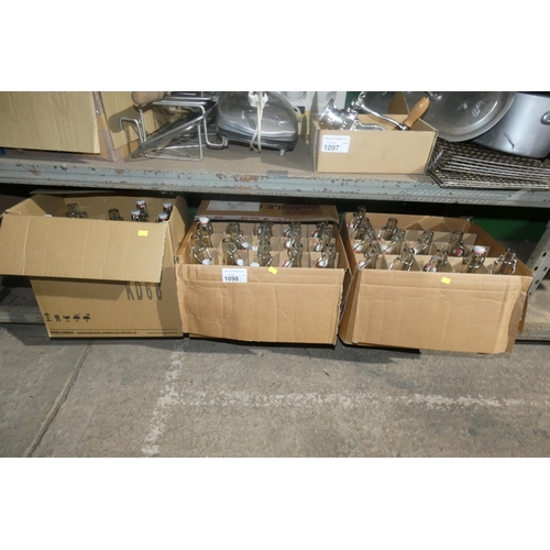 1098 - 3 x boxes containing a quantity of flip top glass bottles branded E-on