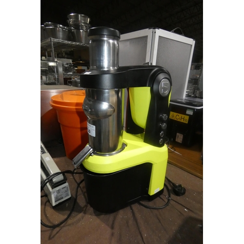 1130 - A commercial juicer by Santos type 65 240v - trade. TESTED WORKING.