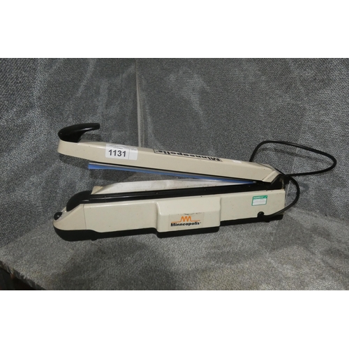 1131 - An adjustable heated manual plastic bag sealer by Minneapolis 240v - trade. REQUIRES ATTENTION.