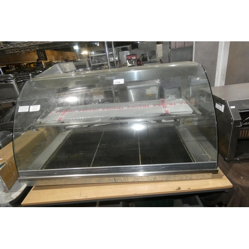 1134 - A commercial stainless steel integrated (drop in counter top) serve over, glass front, heat plate un... 