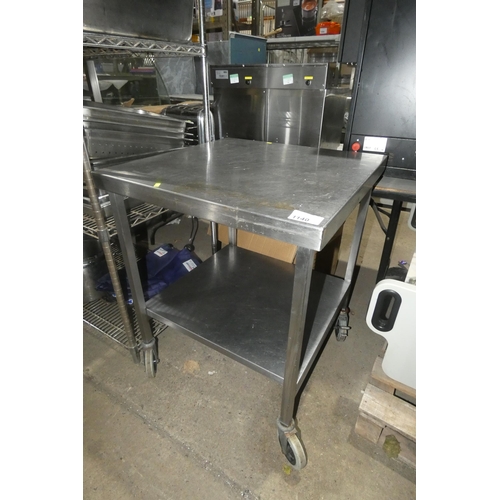 1140 - A square mobile commercial stainless steel catering type table with shelf beneath approx 70cm