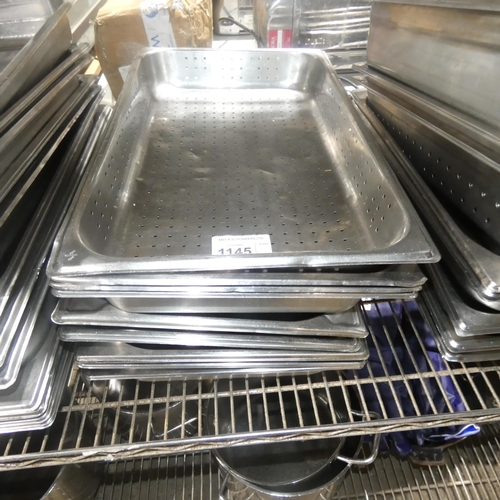 1145 - A quantity of various stainless steel baking trays, 1 stack