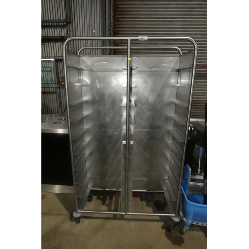 1007 - A mobile commercial stainless steel 20 grid tray rack