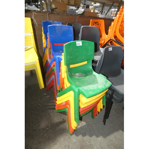 1017 - Approx 20 small plastic multi-colour stacking chairs