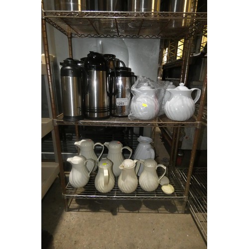 1203 - A quantity of various thermal drink dispensers and jugs, contents of 2 shelves