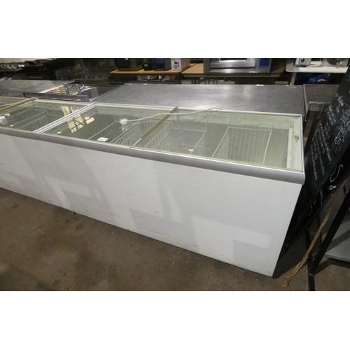 1284 - A large commercial chest/slide top display freezer by Esta approx 170x67cm - trade. TESTED WORKING.