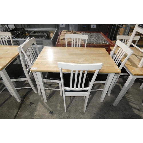 1300 - A rectangular wooden cafe type table with 4  wooden black upholstered chairs approx 110x71cm