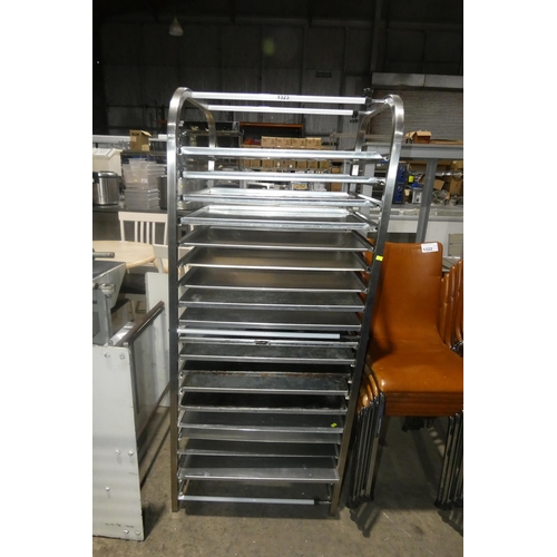 1323 - An adjustable tray rack by Vogue and a quantity of trays