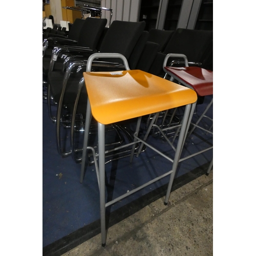 1399 - A Drabert metal framed stool with orange seat pad