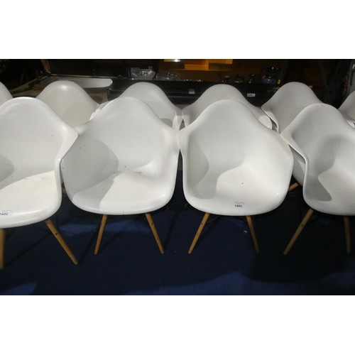 1443 - 4 x white plastic designer style chairs with wood / black metal legs