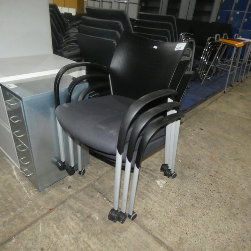 1458 - 3 x Senator stacking wheeled meeting room chairs with black upholstered seats and black plastic back... 