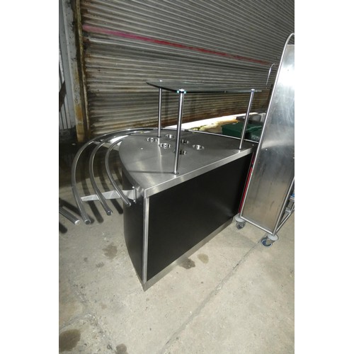 1009 - A commercial stainless steel cutlery station with glass shelf above