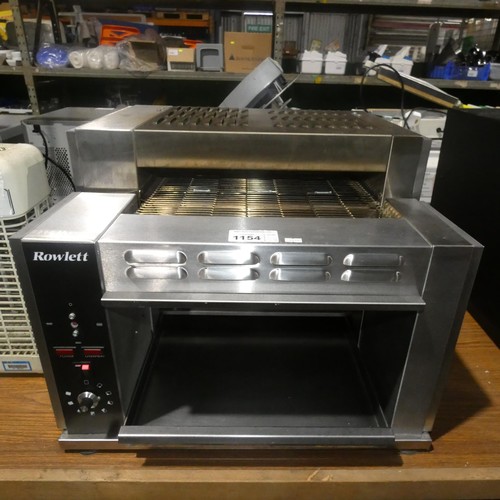 1154 - A commercial stainless steel rotary toaster by Rowlett type 1500-RT/NG 7000w blue industrial plug at... 