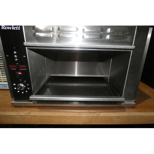 1154 - A commercial stainless steel rotary toaster by Rowlett type 1500-RT/NG 7000w blue industrial plug at... 