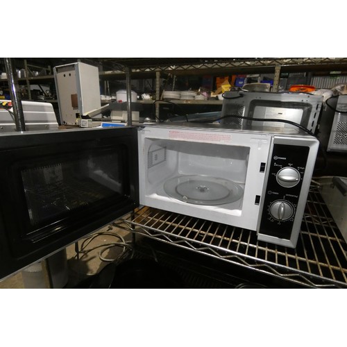 1160 - A microwave oven by Morphy Richards - trade. TESTED WORKING.