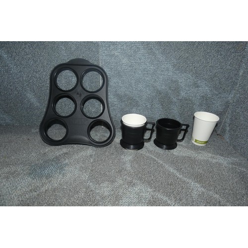 1217 - A large quantity of catering related items including Klix cups, cup holders, 7oz disposable cups and... 