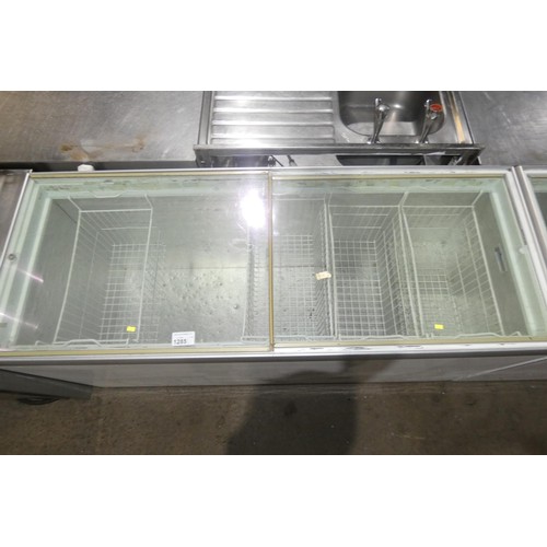 1285 - A large commercial chest/slide top display freezer by Esta approx 170x67cm - trade. TESTED WORKING.