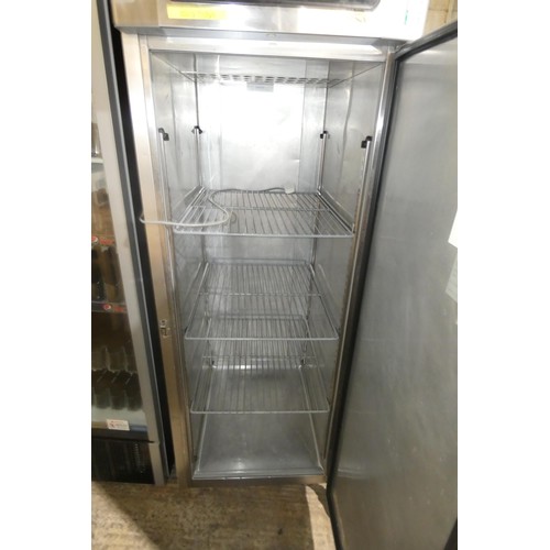 1294 - A tall mobile commercial stainless steel single door fridge no make or model visible approx 70x82x20... 