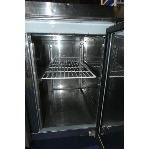 1332 - A mobile commercial stainless steel 2 door bench fridge by Polar no model visible with prep top - tr... 