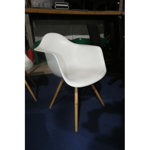 1442 - 4 x white plastic designer style chairs with wood / black metal legs