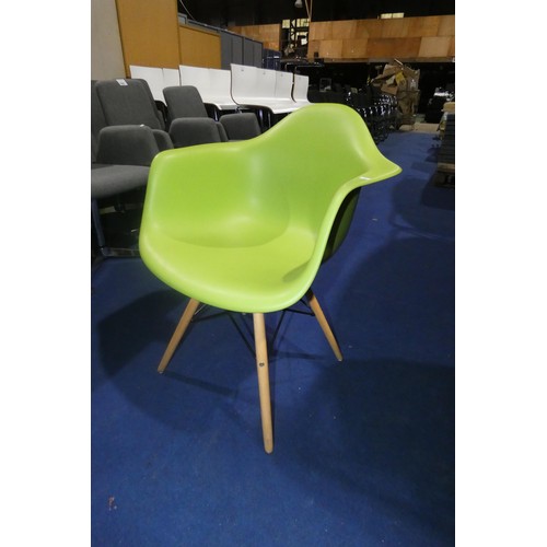 1447 - 4 x green plastic designer style chairs with wood / black metal legs