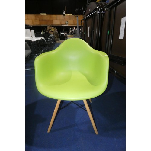 1447 - 4 x green plastic designer style chairs with wood / black metal legs