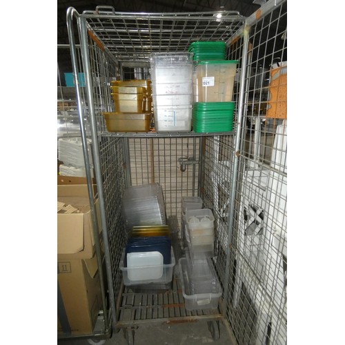 1021 - A quantity of various plastic tubs, measuring containers, lids etc. Contents of a cage, cage not inc... 