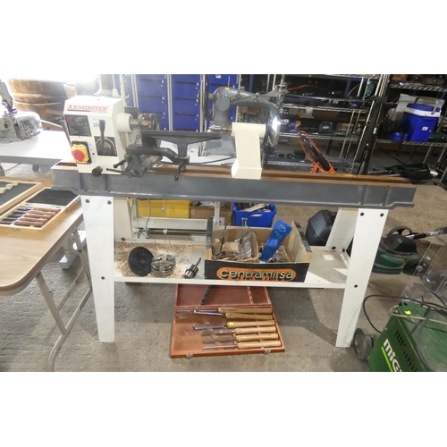 2061 - An Axminster wood turning lathe on stand type AWVSL 1000, 240v supplied with a selection of various ... 