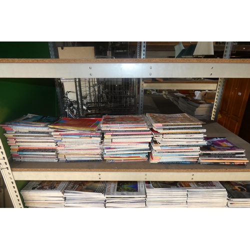 2097 - A quantity of various copies of FHM magazine with a small quantity of several other mens magazines i... 