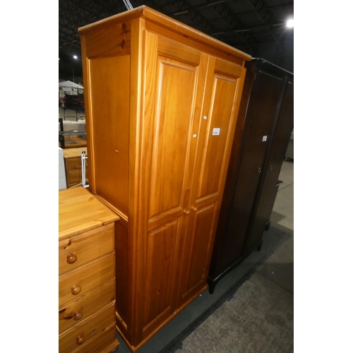 2126 - A pine two door wardrobe approx 75 x 51 x 178cm high