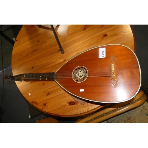 2158 - A vintage lute guitar (German?). Please note that there is a spilt on the left hand side of the case... 