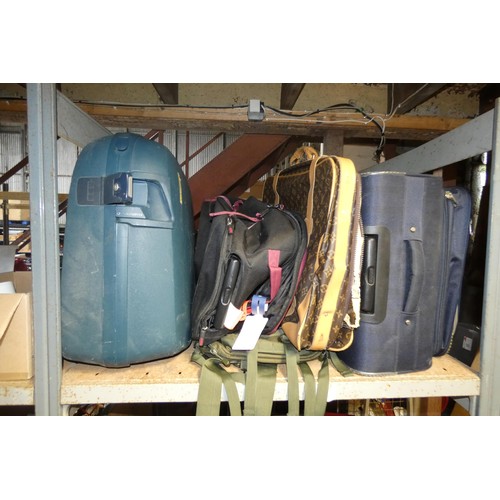 2115 - A quantity of various household items including suitcases, bags, ornaments, crockery, a small desk t... 