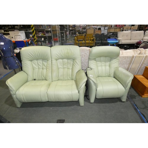 2194 - A light green upholstered two person sofa (both sides have electric reclining function from wired re... 