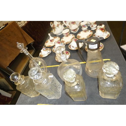 2771 - 6 decorative glass decanters and a glass claret jug