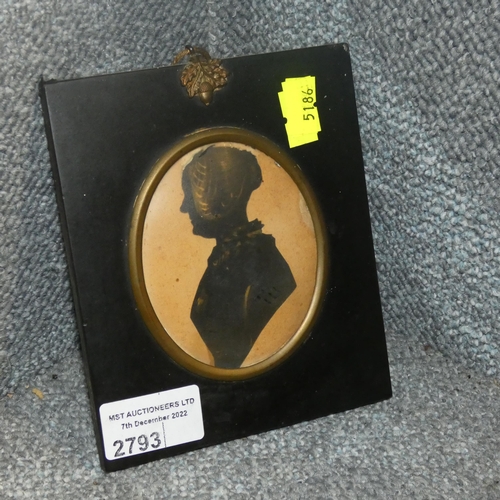 2793 - An oval miniature silhouette portrait of a Lady with bronze highlights in an ebony frame